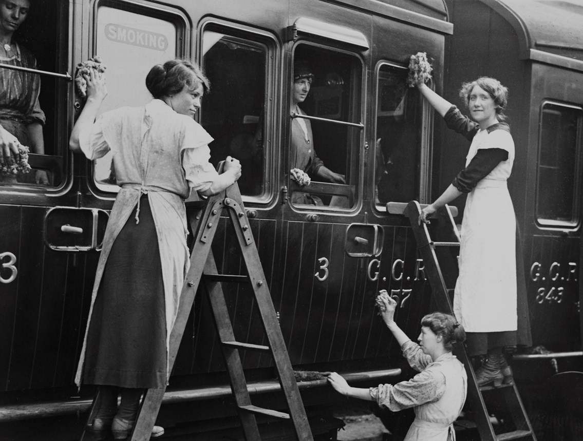 WWI exhibition Women cleaning train carriage: Credit: The National Railway Museum