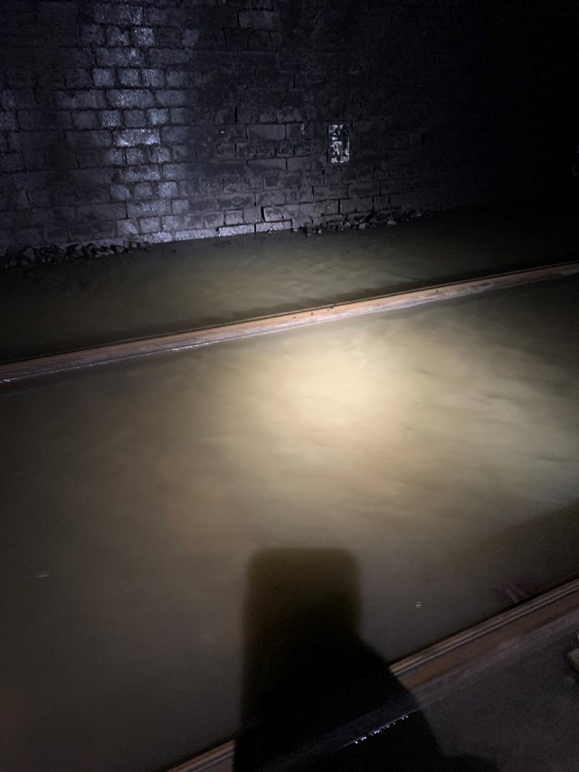 Flooded tracks inside Crick Tunnel