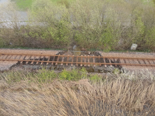 Aerial shot of flood damage at Dolgarrog on the Conwy Valley Line in North Wales, April 2024-3: Aerial shot of flood damage at Dolgarrog on the Conwy Valley Line in North Wales, April 2024-3