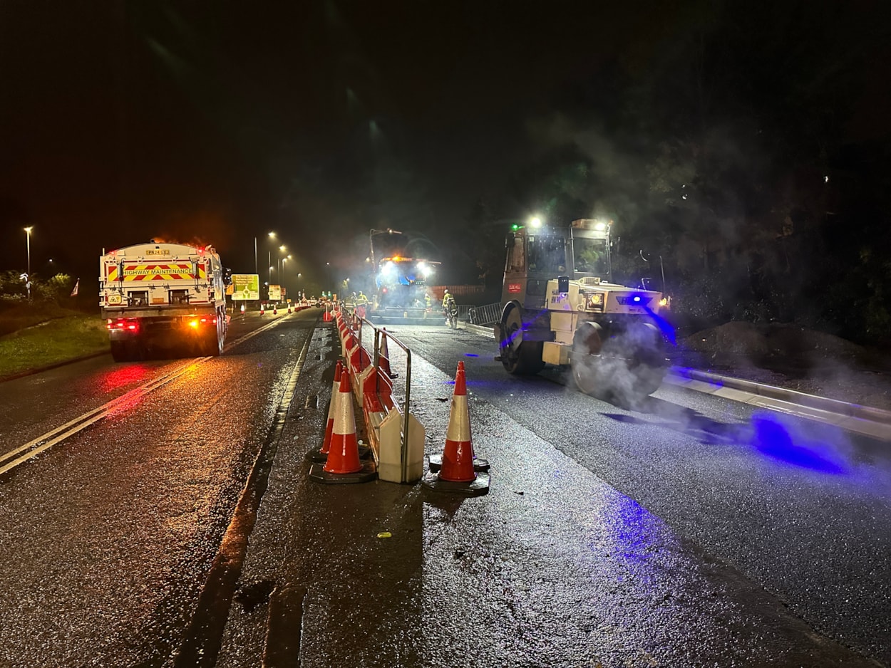 Night-time surfacing works generic example: Highways vehicles surfacing the road at night