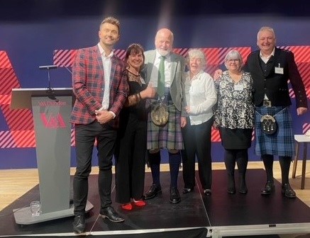 L-R) Award ceremony host Sean Batty with Moray Council Community Safety Officer Tracey Rae, Gordon McDonald, Linda McDonald, Donna McKay and Kevin McKay from Buckie Area Forum.