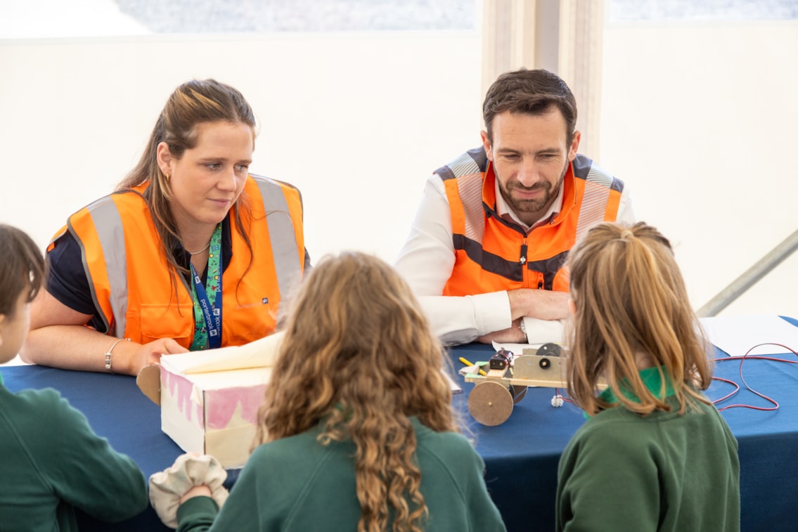 Porterbrook’s Ben Ackroyd and Olivia Wallace getting involved with the Primary Engineer challenges. Credit Porterbrook