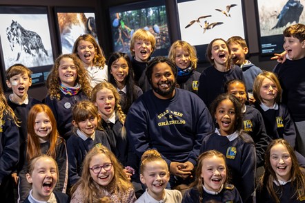 Wildlife cameraman and presenter Hamza Yassin met children from Edinburgh's Bun Sgoil Taobh Na Pairce (Parkside Primary School) at the opening of the new exhibition, Wildlife Photographer of the Year, which opens on Saturday 20 January at the National Museum of Scotland. Image © Duncan McGlynn-4