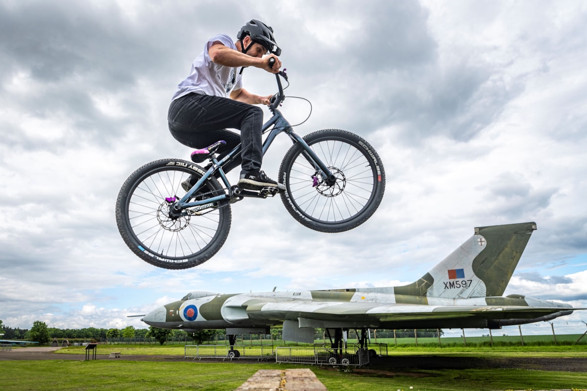 Cycling stunt team The Clan practice ahead of 360 Fest at the National Museum of Flight. Photo (c) Andy Catlin (4)