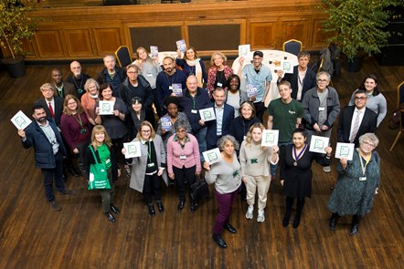 Attendees at the launch of the Islington Together festival gather at Islington Assembly Hall