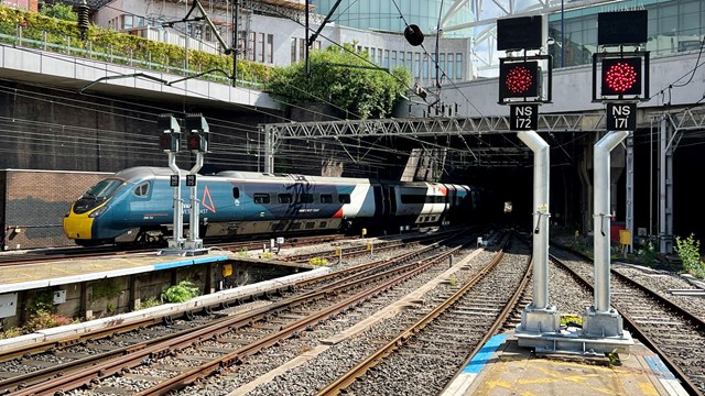 Power line fault stops all trains at Birmingham New Street station: Birmingham New Street new signals with Avanti West Coast train in background