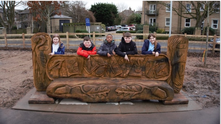 New community-designed carved oak bench unveiled in Otley’s Tittybottle Park