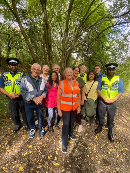 Walk leader Debbie Parkes (orange high-vis) with Councillor Andrea Goddard (Left of Debbie) and local community walkers PT