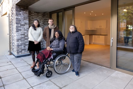 Cllr Woolf, Executive Member for Homes and Neighbourhoods alongside Hillrise ward councillors on the balcony of a new home