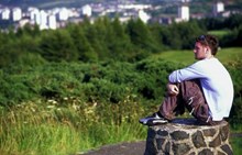 Young man looking at view, Lyle Hill, Greenock ©George Logan/SNH: Young man looking at view, Lyle Hill, Greenock©George Logan/SNH