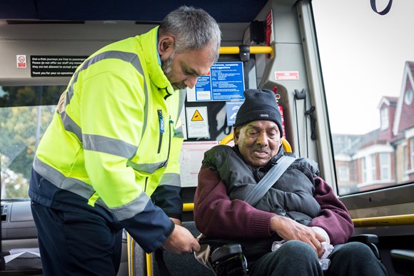 TfL Image - Dial a Ride driver assists a customer