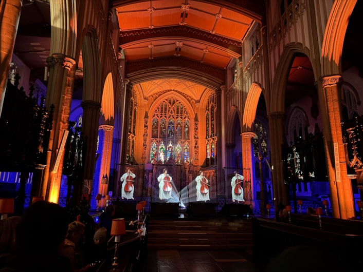 Eternal Ensemble - ONYVA! Studio: Eternal Ensemble at Leeds Minster sees a cellist appearing to perform across multiple points, as spatial audio and immersive projection repeat, layer and transform the performance.