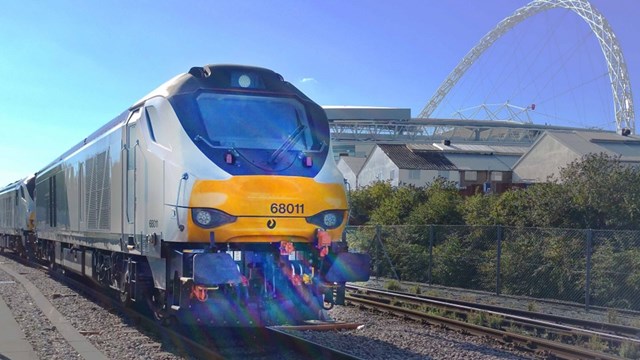 Liverpool and Man City fans advised to avoid rail travel for FA Cup semi-final: Chiltern train passing Wembley stadium stockshot - Credit Chiltern Railways