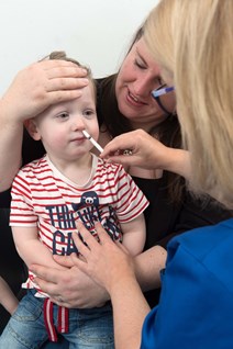 Finlay Warburton receives his flu vaccination