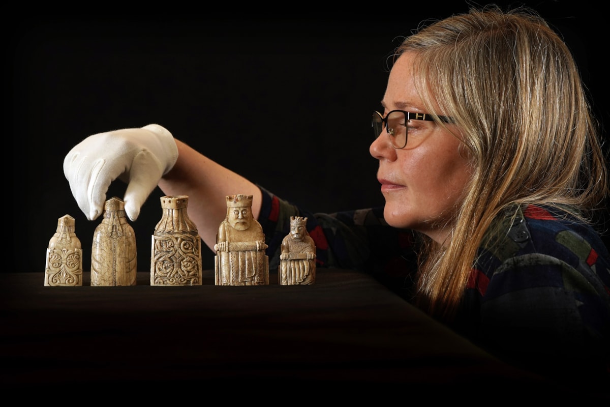 Dr Alice Blackwell with some of the Lewis chess pieces. Copyright Stewart Attwood (11)