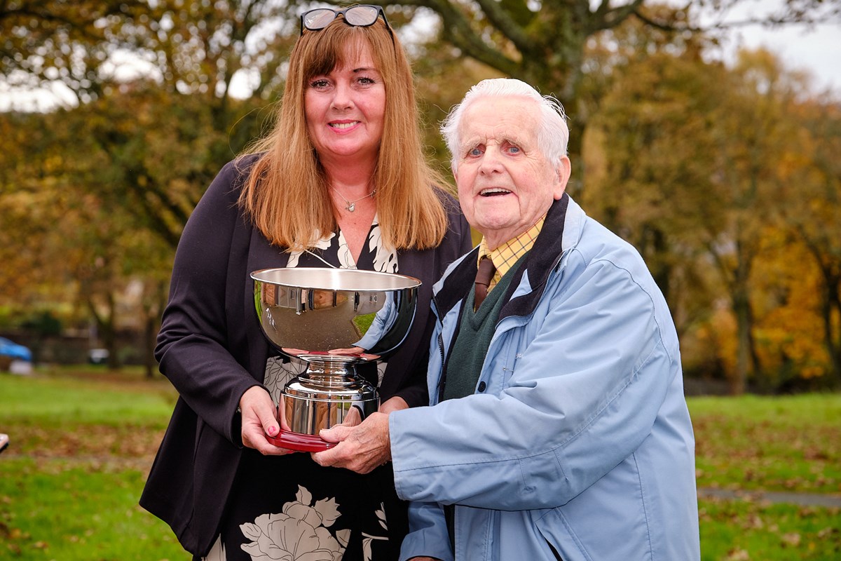 Jennifer's daughter Sharon presents the Jennifer Elliot memorial award to Mr Mitchell