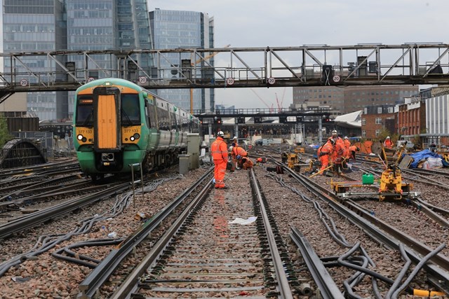 London Bridge: Working with lines open and the rain falling