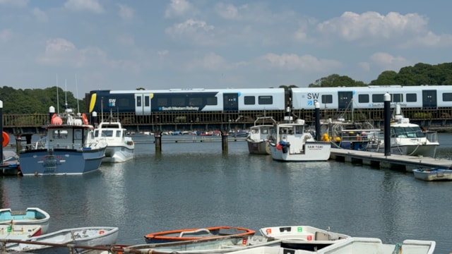 ONE MONTH TO GO: Engineering upgrades to close Lymington branch line: Train running over Lymington Pier