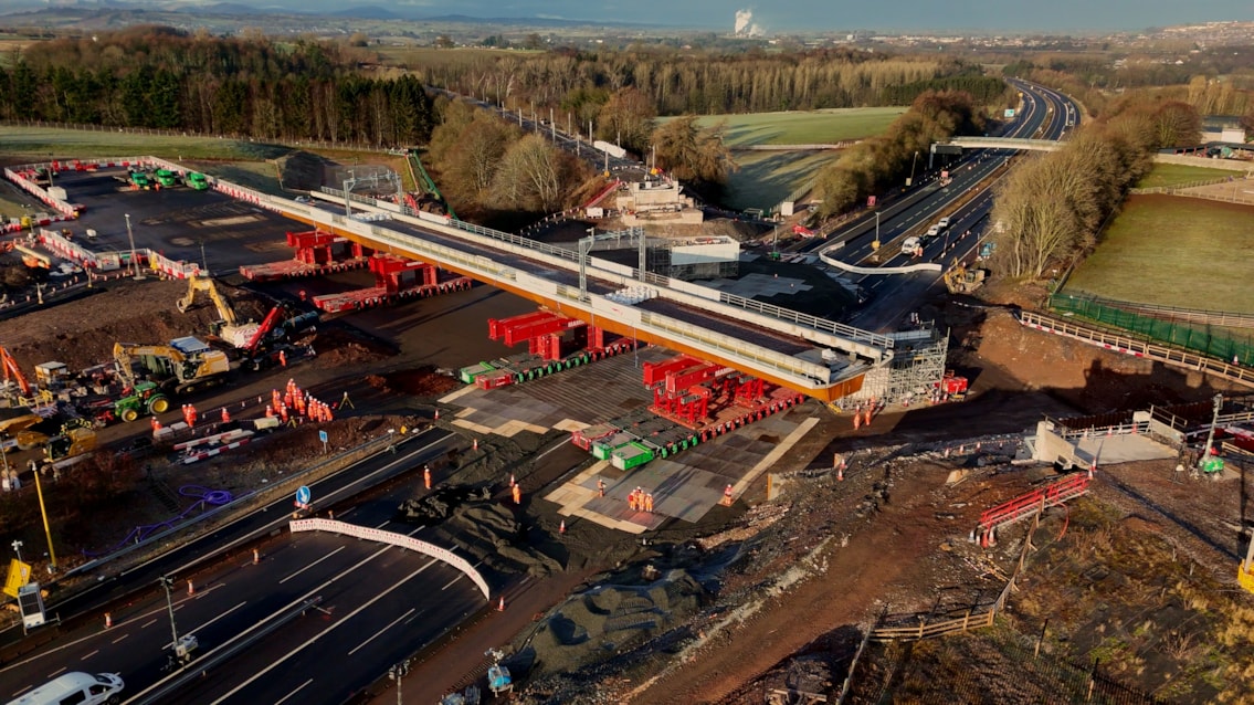 Drone shot of new Clifton railway bridge being driven into position over M6