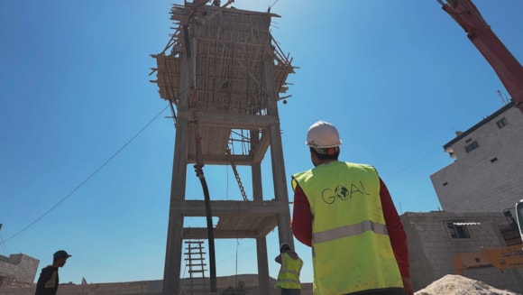 GOAL and the EU Reach over a Million People in Northwest Syria with Vital Assistance following February 2023 Earthquakes: GOAL teams are constructing a water tower to ensure that residents of Al-Wadah displacement camp, host to more than 5,000 people, can have regular access to clean piped water. Jandires, Northern Aleppo, Syria. April 2024.-3