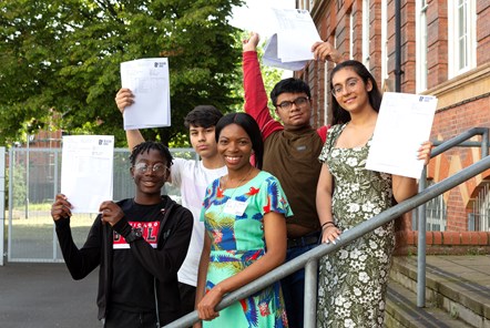 Cllr Michelline Safi-Ngongo with students at Beacon High (L-R) Daniel, Giovanni, Yaseem and Prabhleen