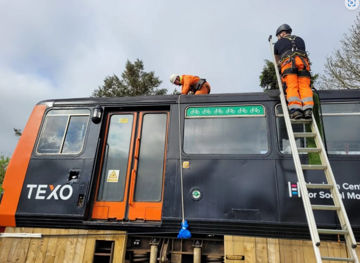 An image of Northern engineers working on the old Pacer train at The Dales School in Blyth