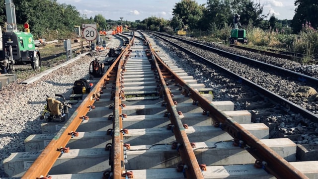 Network Rail engineers installing new equipment at Knighton Junction
