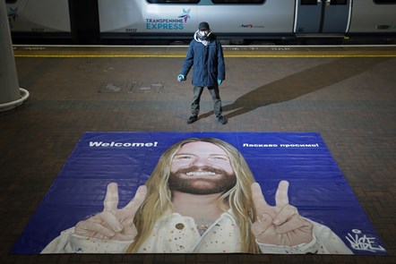 Eurovision sensation, Sam Ryder, has been immortalised on a mural at Manchester Airport Station - street artist Aske was commisioned by TransPennine Express