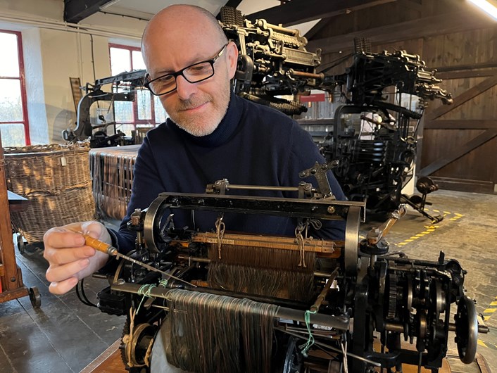Miniature loom: John McGoldrick, Leeds Museums and Galleries' curator of industrial history, conserves the miniature scale model of the looms manufactured by Barnsley’s Wilson and Longbottom.
