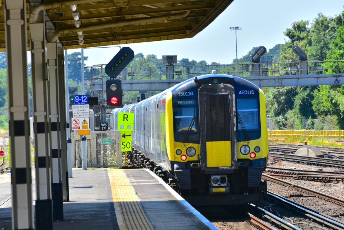 Train leaving Woking Station