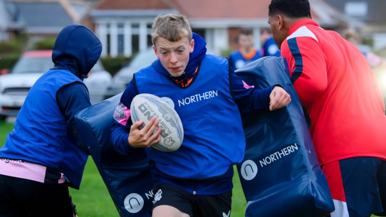 Rugby team wins kit and Grand Final tickets in competition run by Northern