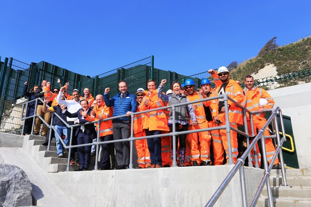 Dover -Shakespeare Beach: Residents, dog walkers, Network Rail and Costain engineers, MP Charlie Elphicke and the Channel Swimming Association celebrate the opening of Shakespeare Beach and the new footbridge access to it