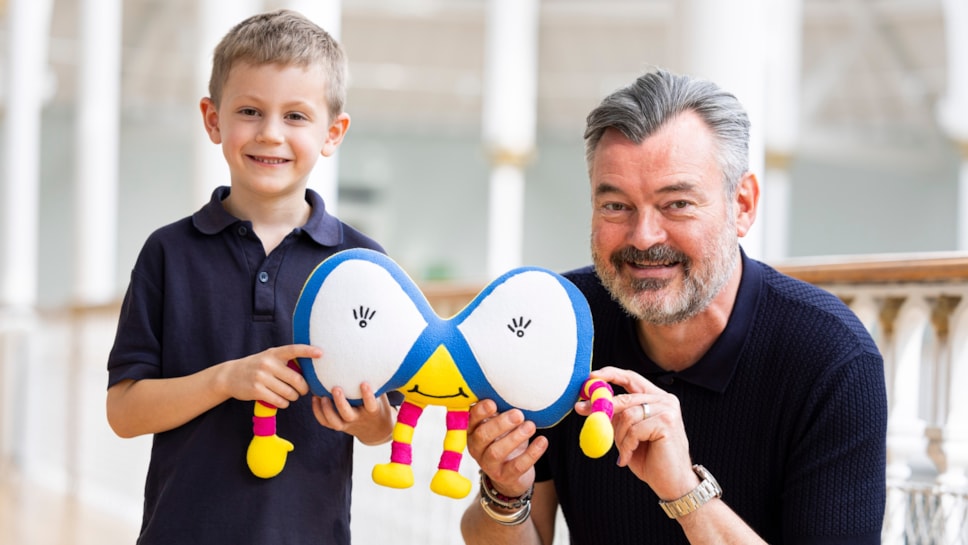 Grant Stott presents 7-year-old William Lunsden with his winning Mathscot design at the National Museum of Scotland. Photo (c) Duncan McGlynn (2)