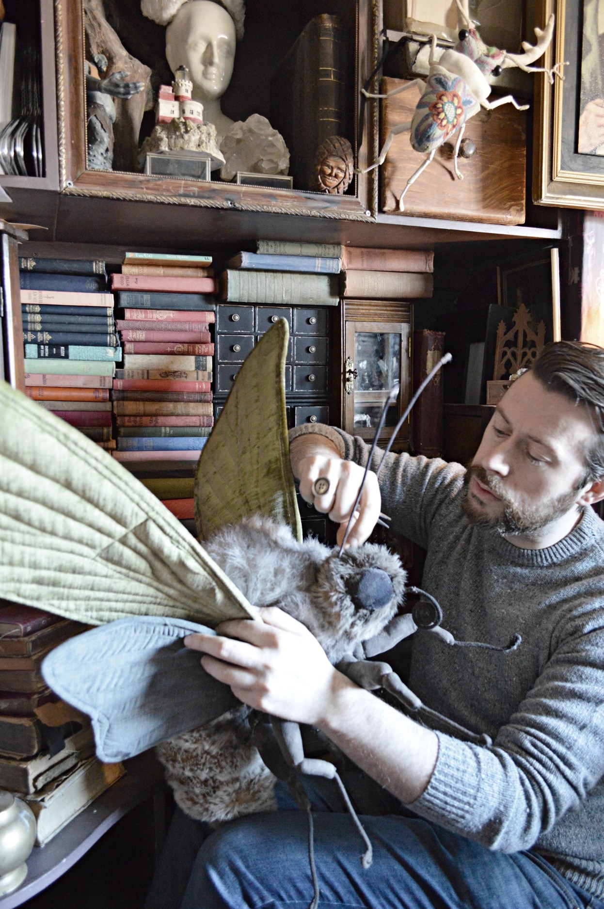 The Museum of Figments: Artist Mr Finch works on one of his incredible textile creations like those that will feature in his new book.