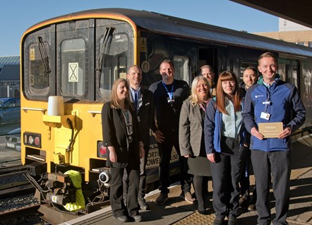 Image shows Northern's Intelligent Trains concept train with staff at Bradford Interchange
