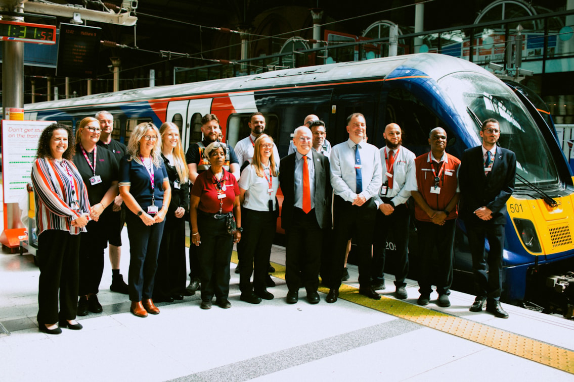 GBR Anglia - First GBR trains for Anglia 16.07.26: Peter, Lord Hendy of Richmond Hill, Minister for Rail and Jamie Burles, managing director for GBR Anglia with staff from Greater Anglia and c2c standing beside a newly branded GBR trains at London Liverpool Street station on Thursday 16 July 2026.