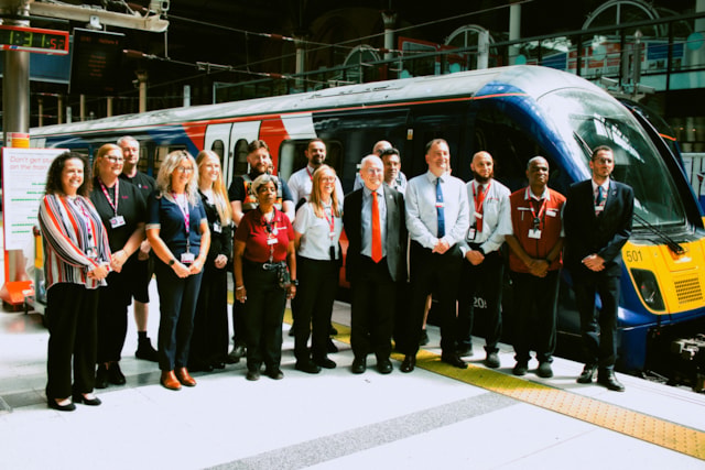 GBR Anglia - First GBR trains for Anglia 16.07.26: Peter, Lord Hendy of Richmond Hill, Minister for Rail and Jamie Burles, managing director for GBR Anglia with staff from Greater Anglia and c2c standing beside a newly branded GBR trains at London Liverpool Street station on Thursday 16 July 2026.