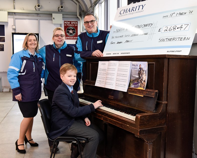 Musical schoolboy hits the right notes for mental health charity: 4. Harrison and station staff