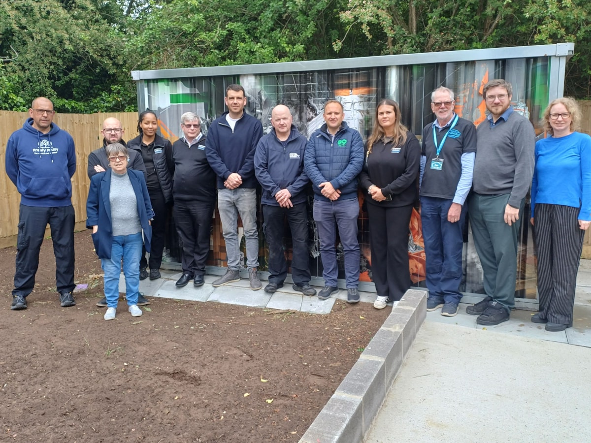 Staff from Morgan Sindall, Reading Borough Council and Whitley Wood Pantry gather at the new community garden