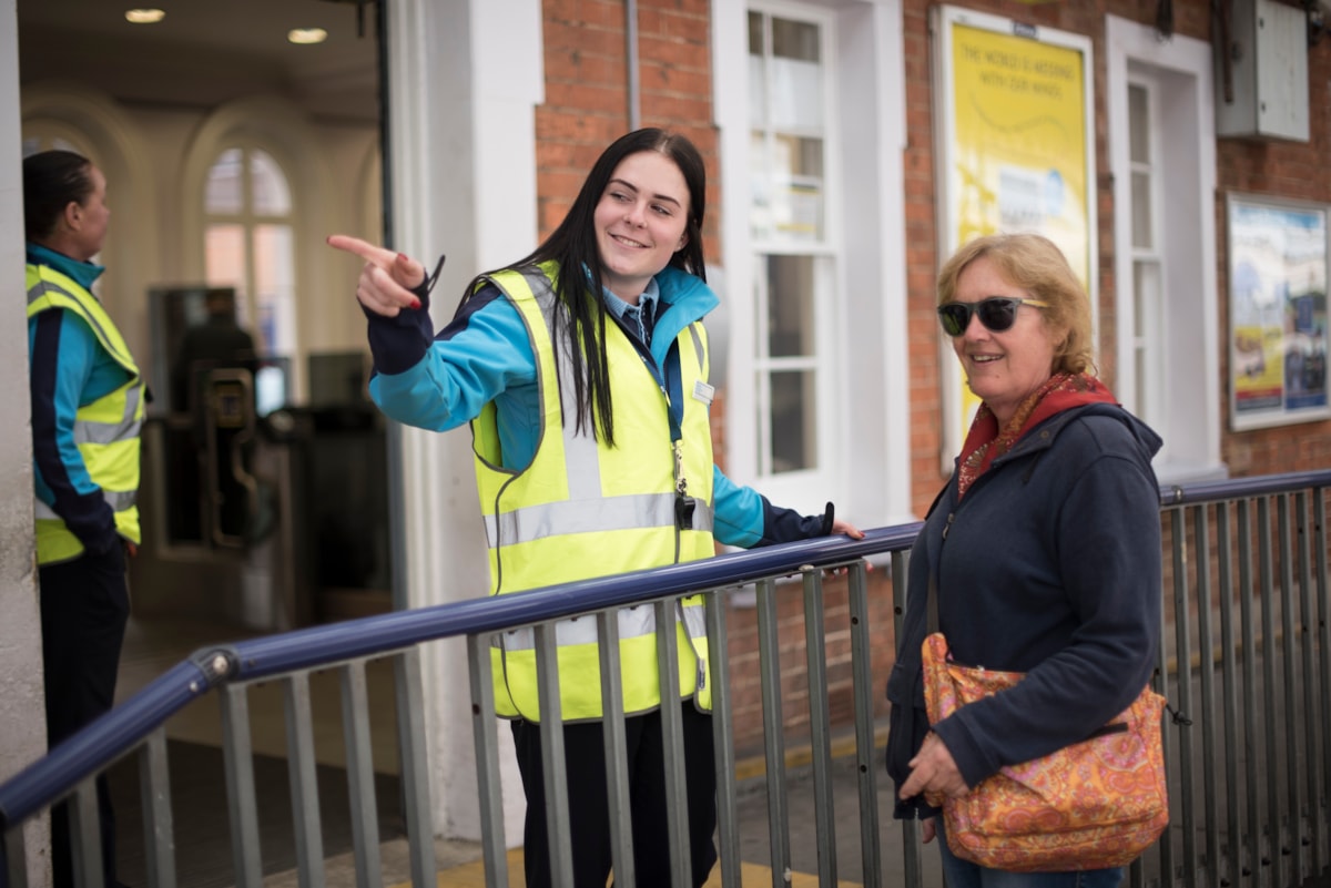 Female colleague Emily, platform staff helping passenger at Tunbridge Wells station (3)