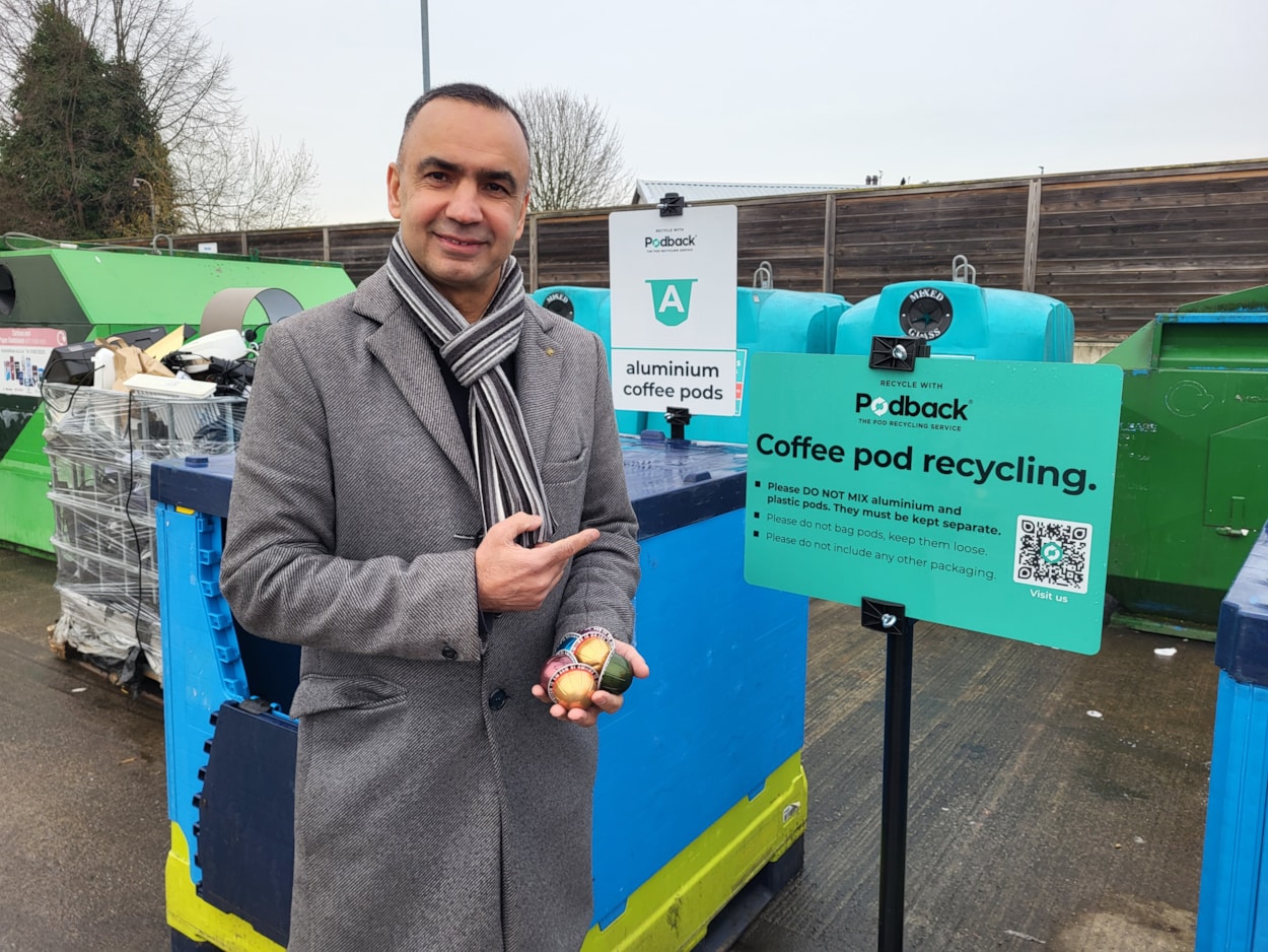 Podback banks at Kirkstall - Cllr Mohammed Rafique - landscape: Cllr Mohammed Rafique at the new Podback recycling facilities at Kirkstall Household Waste Recycling Centre in Leeds