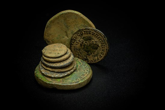 Roman coins uncovered during the archaeology excavation at Blackgrounds, Chipping Warden, Northamptonshire