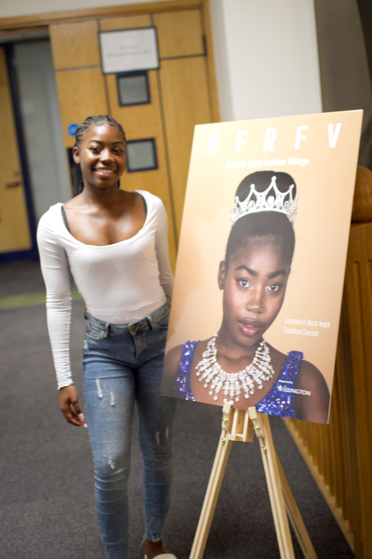 Volunteer model Nyahrae Glasgow with her front-cover image on the #FRFV lookbook.