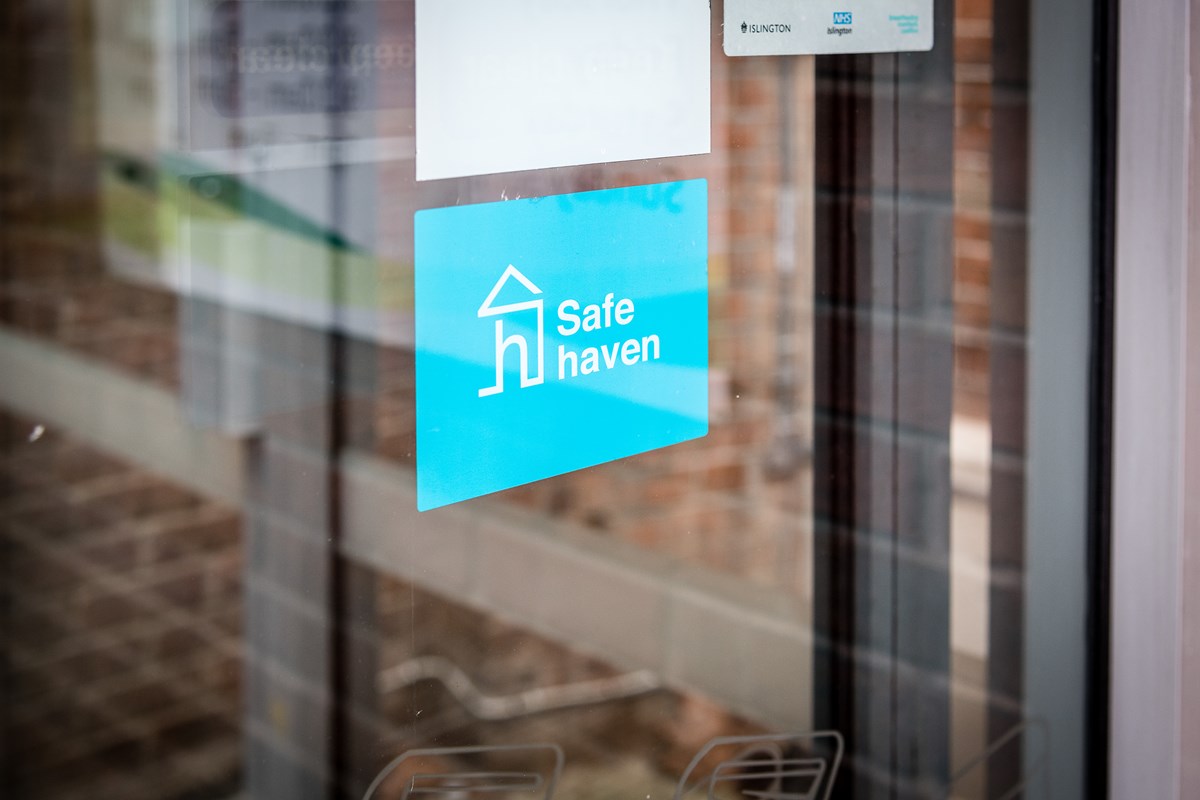Photo of the Safe Haven sticker displayed in the glass door of Central Library.