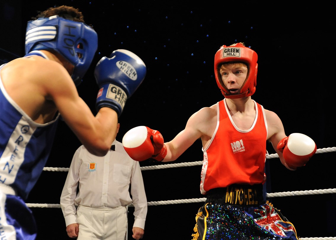 Gloves' Lee Mitchell (red) v Josh Pritchard (blue) from Portsmouth in the No Messin' tri-national boxing competition: Gloves' Lee Mitchell (red) v Josh Pritchard (blue) from Portsmouth in the No Messin' tri-national boxing competition