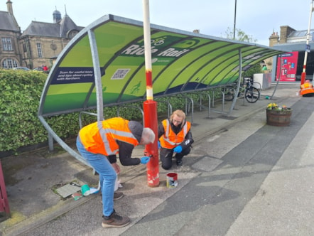 An image of volunteers working to improve Ilkley Station