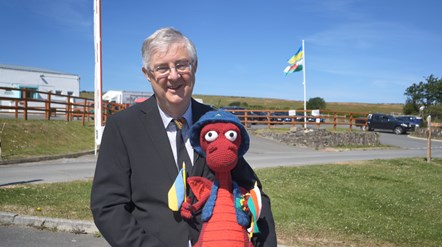 First Minister with a Welsh dragon crocheted by a person from Ukraine-2