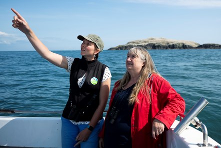 Welsh Government Minister for Climate Change Julie James views Grassholm from an RSPCA boat after Pembrokeshire County Council confirms hundreds of dead wild sea birds have washed up on their beaches in recent days with suspected avian influenza.  Grassholm is home to one of the world’s most importa