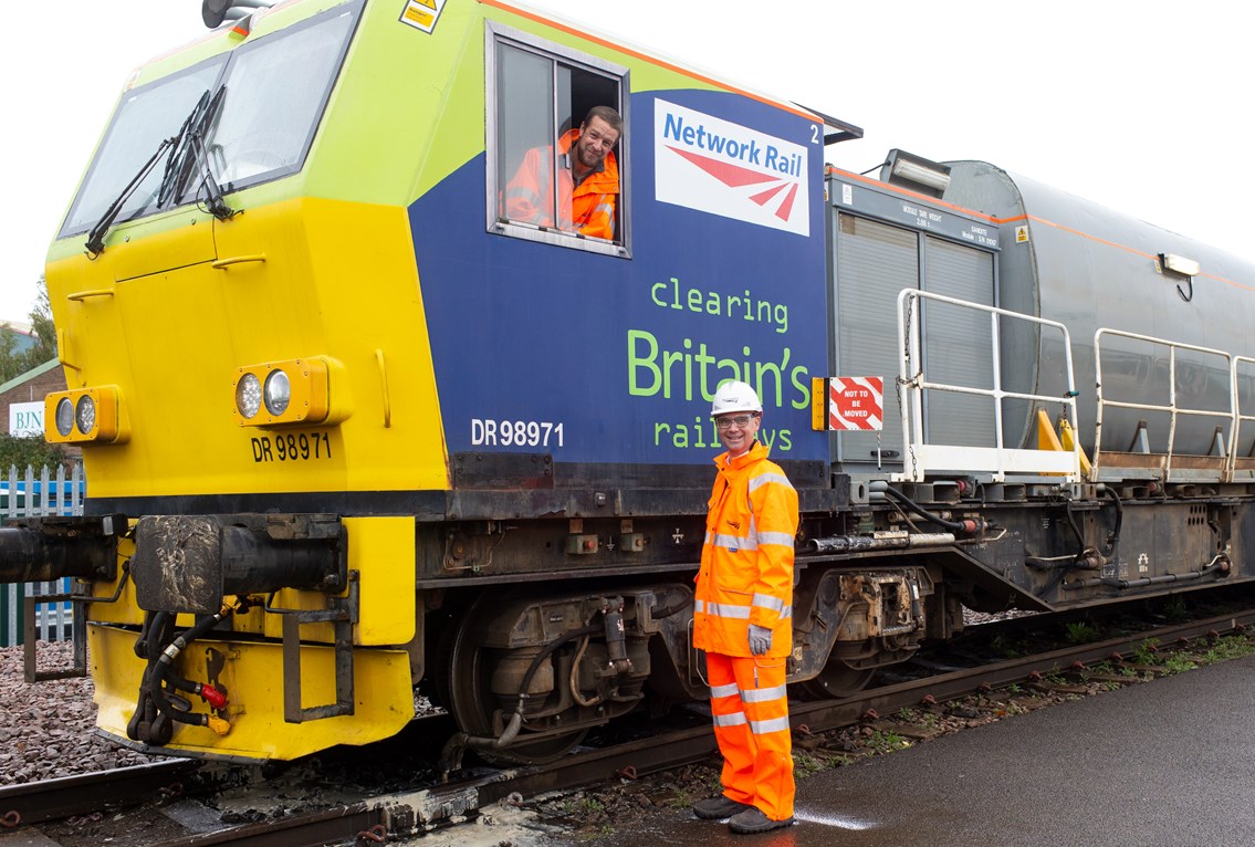 Paul Plawecki of Balfour Beatty and Rob Davis of Network Rail with a leaf-busting train: Paul Plawecki of Balfour Beatty and Rob Davis of Network Rail with a leaf-busting train (called an MPV)