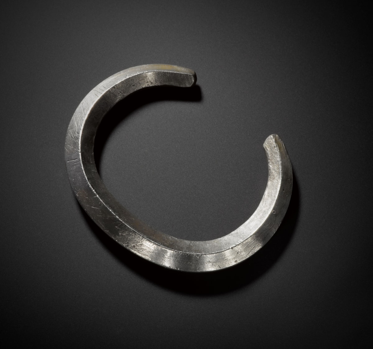 A silver arm ring from the Burray Hoard. Image © National Museums Scotland-2